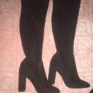 Black thigh high boots